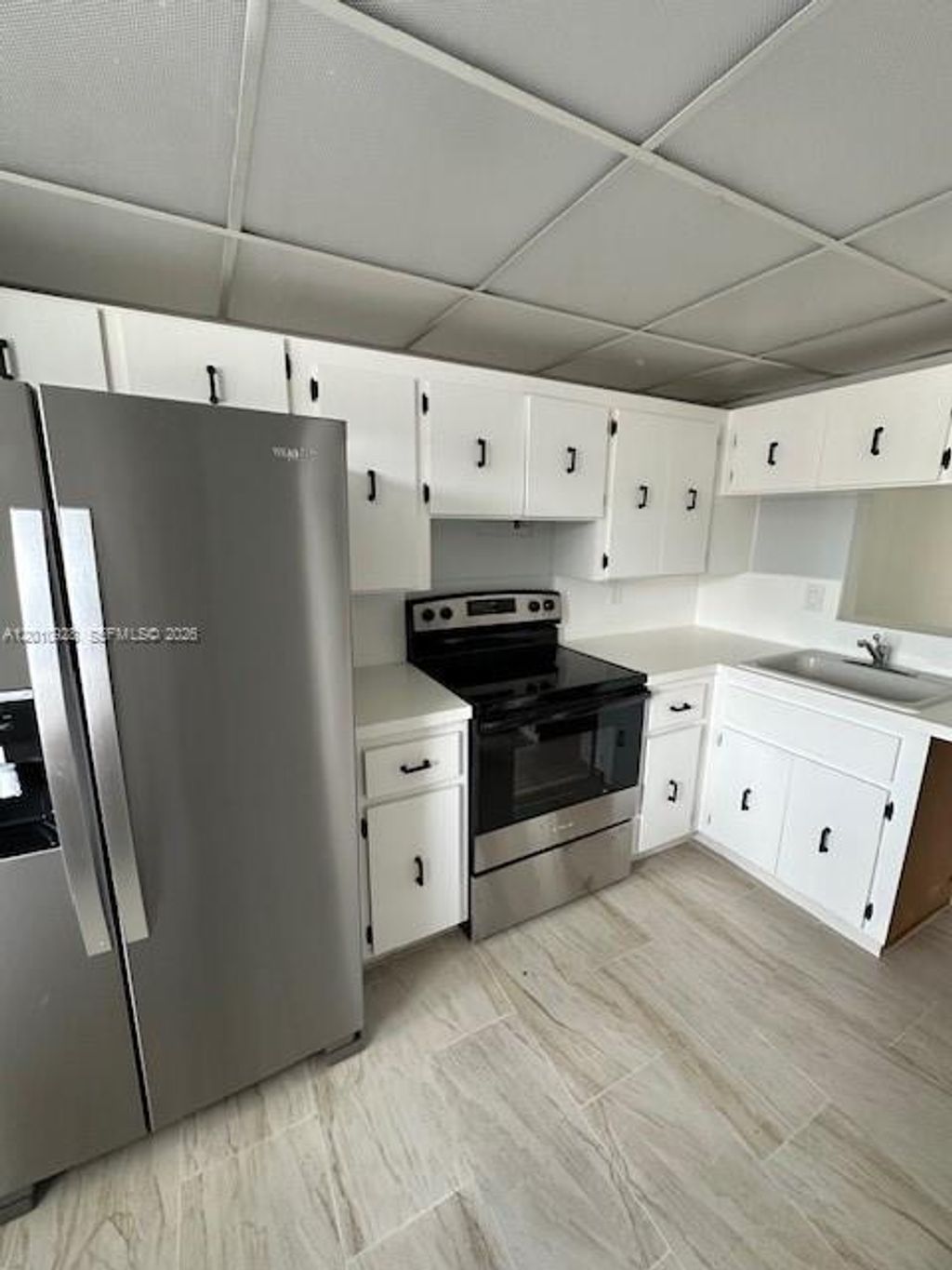 Photo of 3571 Inverrary Dr #202, Lauderhill, FL 33319 (MLS # A12010928)