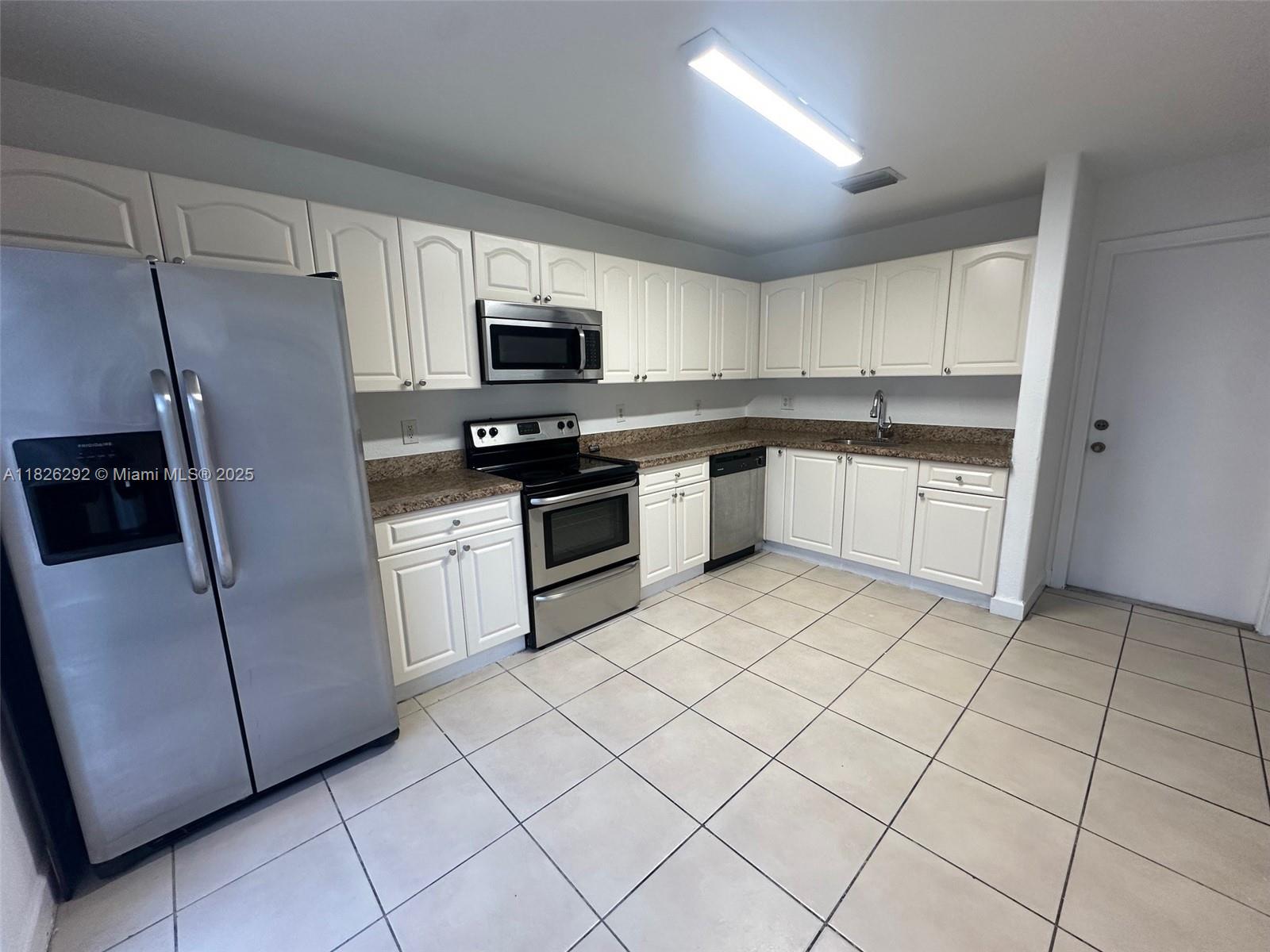 Spacious unit in convenient location near highways and shopping. Laundry inside the unit.