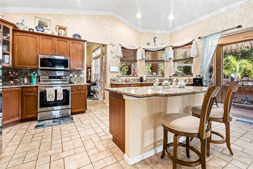 Photo of 5026 Coconut Blvd, Palm Beach, FL 33411 (MLS # A11984226)