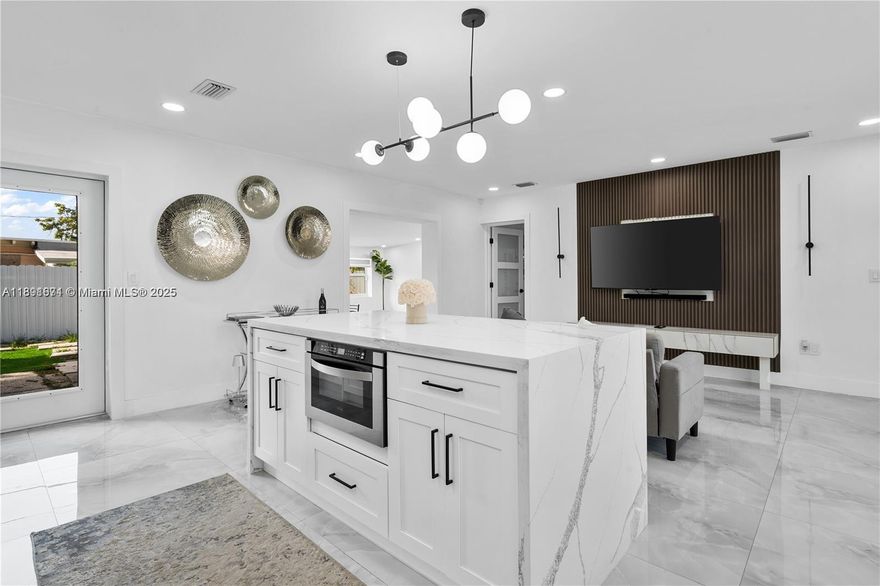 Welcome to your dream home—this stunning luxury family home offers the perfect blend of comfort, and tranquility. The property features 3 spacious bedrooms and 2 full bathrooms, soaring high ceilings, and an open-concept layout flooded with natural light. Step outside and take in the serene breeze of a quick neighborhood, complete with a bench for peaceful reflection. For ultimate relaxation, enjoy the backyard, or have some fun living close to every mayor event in Miami.