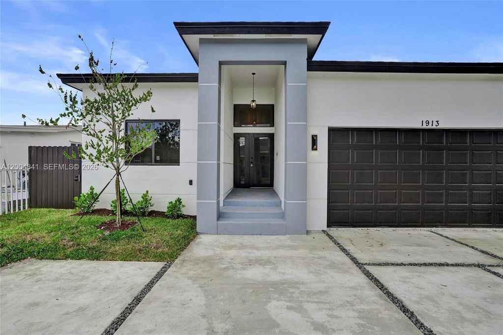 Photo of 1913 SW 97th Ave, Miramar, FL 33025 (MLS # A12004841)