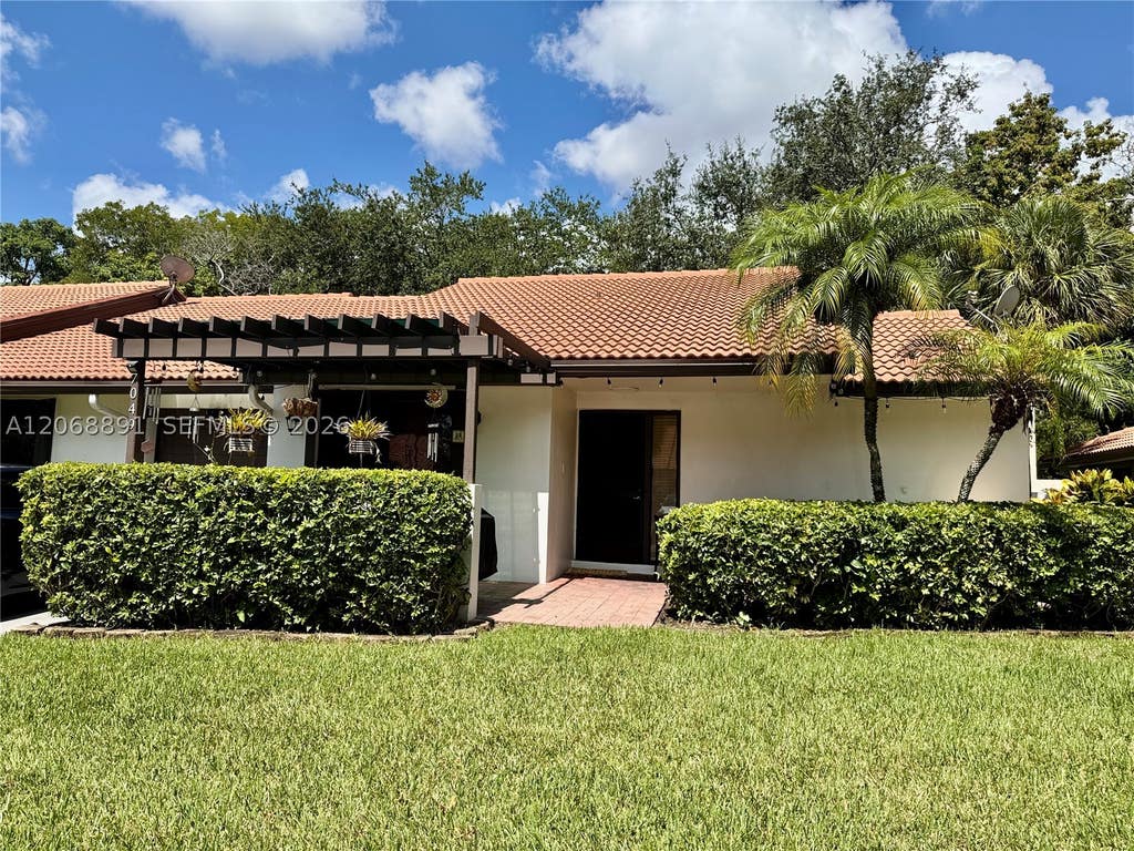Photo of 7049 Marlberry Ln #7049, Tamarac, FL 33321 (MLS # A12068891)