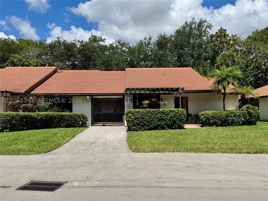 Photo of 7049 Marlberry Ln #7049, Tamarac, FL 33321 (MLS # A12068891)