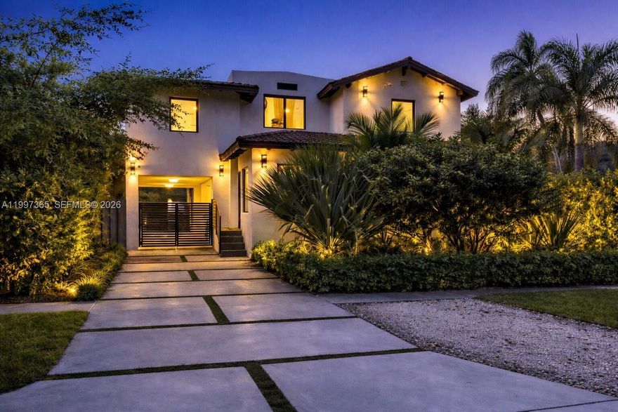 A masterfully reimagined Spanish Mediterranean compound where timeless architecture meets bespoke modern design.Set within a private, lushly landscaped setting, this residence offers nearly 3,000 SF of refined living space, including a 4-bedroom, 3-bath main home and a detached two-story guest house 569 sqft living area.The first level has been thoughtfully redesigned by Miami-based Moniomi designers, featuring custom millwork, curated finishes, and light-filled open living spaces. A built-in dining banquette and elegantly composed interiors flow into a chef’s kitchen centered around an oversized island and outfitted with professional-grade Thermador appliances.Upstairs, private quarters continue the elevated design with refined finishes and premium fixtures, including Toto toilets.Offered fully furnished with high-end designer pieces, the home delivers a seamless turnkey experience.The detached guest house includes its own kitchen, living area, full bath, and private upstairs bedroom—ideal for guests, a home office, or income-producing use.Outdoors, mature tropical landscaping surrounds a sleek pool and spa, with fully gated grounds creating a private, resort-like setting.A rare opportunity to own a design-forward, fully furnished compound defined by craftsmanship, privacy, and versatility.