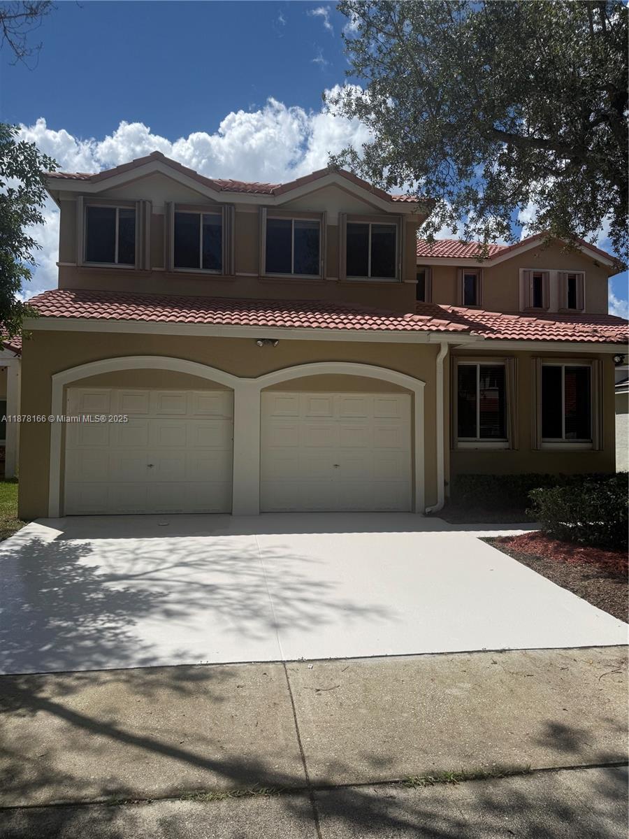 This stunning two-story home features 4 spacious bedrooms, 3 modern bathrooms, and a high vaulted ceiling in the living room that enhances the airy, open feel. An additional versatile space can easily be converted into a 5th bedroom or a home office. The kitchen has been elegantly renovated with white cabinets, quartz countertops and the house is freshly painted. Nestled in the prestigious , gated community of "The Islands of Weston", this home is located in one of the most beautiful and safest cities, Weston. Enjoy outdoor living in the expensive, fenced backyard perfect for relaxing entertaining.