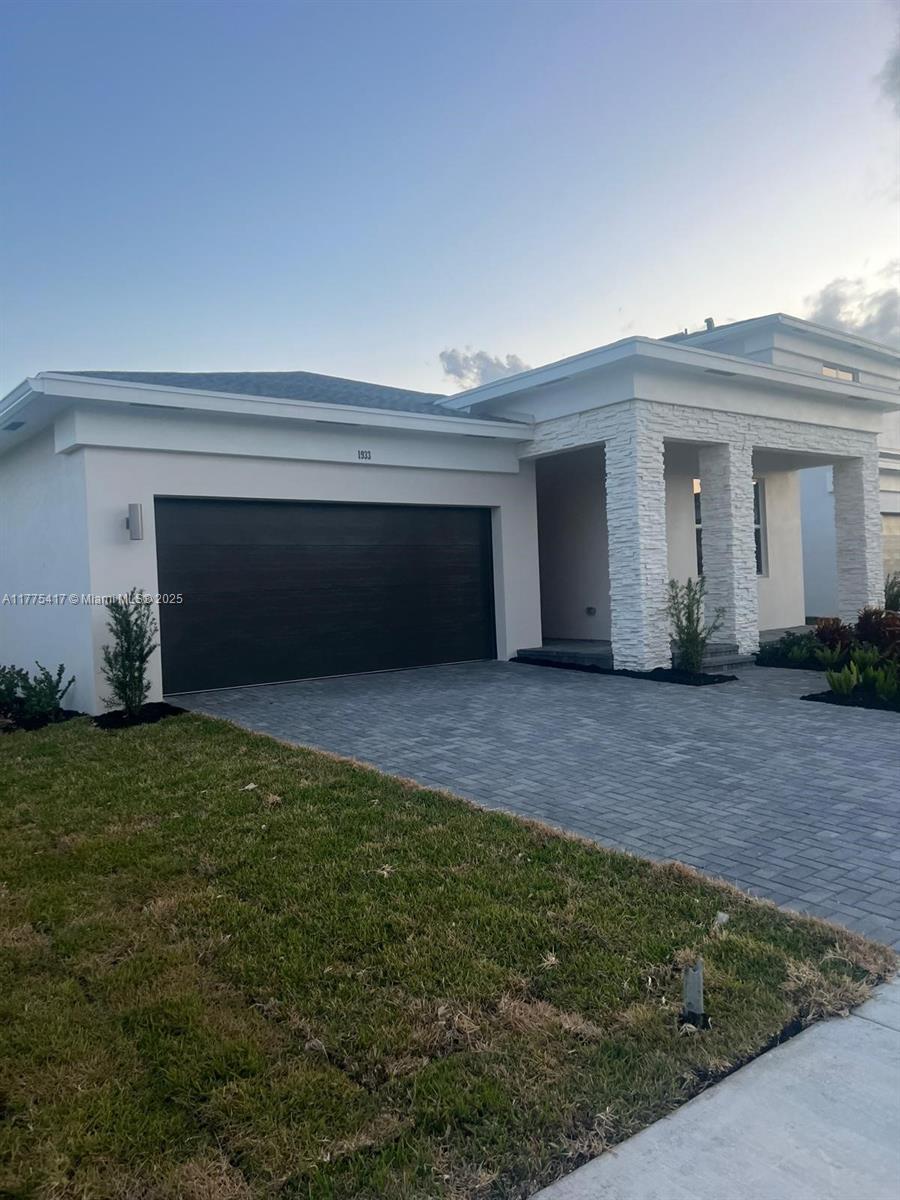 This beautiful, brand-new, one-story home features 4 bedrooms, 3 bathrooms, and a spacious 2-car garage. The open floorplan welcomes you with a family room, dining room, and kitchen that seamlessly flow into a covered terrace, perfect for outdoor living. The large owner's suite offers privacy, and one flexible bedroom is ideal for guests or a home office. Enjoy resort-style amenities including a clubhouse, pool, fitness center, and 20 miles of walking trails. Located near highly rated Wellington schools, grocery stores, shopping, and medical facilities, this home offers both convenience and luxury. Beautiful Blinds and Top of the line Fans.
