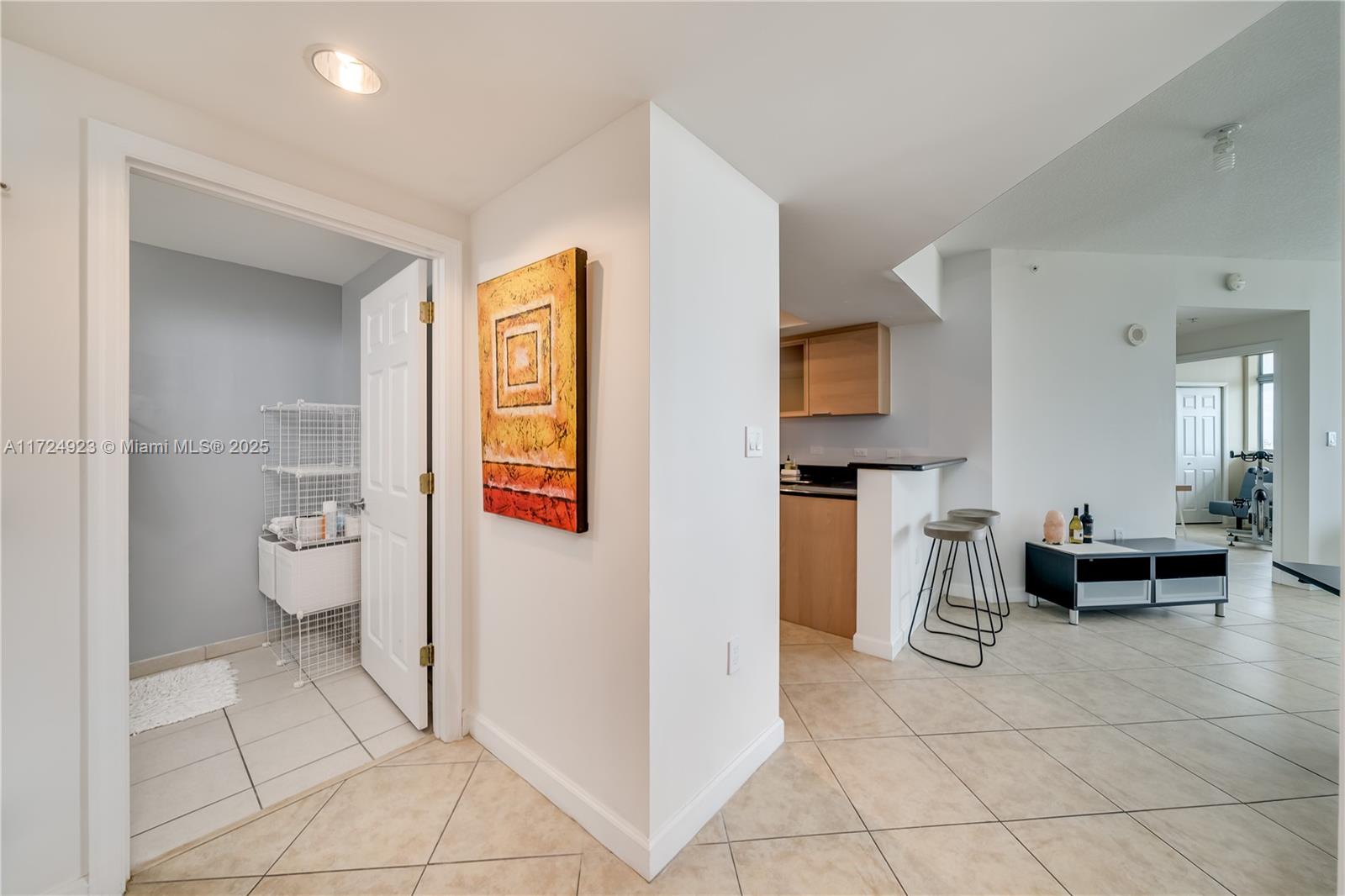 Converted 2-bedroom, 1.5-bathroom apartment with a wraparound balcony overlooking downtown Hollywood. Spacious living area with ample windows. Kitchen features granite countertops and stainless steel appliances. Can be furnished.2 parking garage included and assigned. Condo amenities include a gym, sports lounge, 24/7 front desk, bike storage, pool, and valet parking (fee applies). Walk to shops, galleries, restaurants, and supermarket. Close to the beach, Aventura, Fort Lauderdale, and major highways.