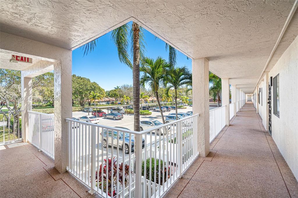 Photo of 6093 Pointe Regal Cir #210, Delray Beach, FL 33484 (MLS # A11969300)