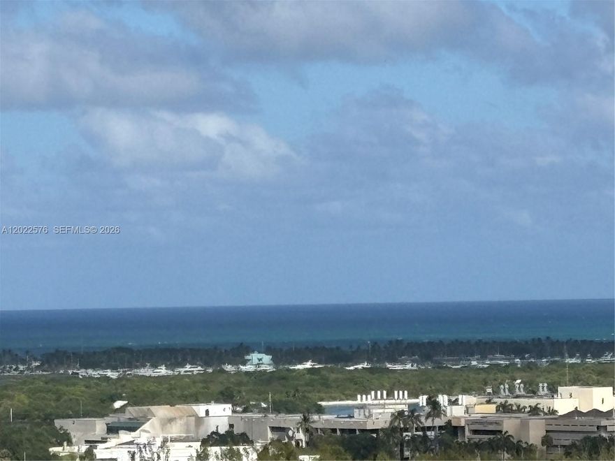 Believe or not, You have an Ocean view from this unit. Spectacular Sunrise. Large floor plan corner unit. 2,385 SF living space. 3 bedrooms plus an Enclosed DEN, that could be used as a 4th bedroom or home office. Large closets, 3 bathrooms plus half bath. Breathtaking unobstructed panoramic views of the Ocean, Oleta River Park, Crystal Lagoon & Miami skyline. Great amenities, clubroom, heated pool, gym, tennis court, playground, dog park, valet parking. Water, basic cable, internet, amenities, motorcycle & bike room, 4 EV charging stations included with HOA fees. One assigned covered parking space, additional spots can be rented for $65/month. No more land-lease, land has been purchased. Special Assessment in place. SA1 $195.58, SA2 $212.61 HOA $2,020,64 Total Monthly payment $2,428.83. Just $1.02 per sqft (Including Special Assessments), below Miami's average condo fees. Tenant until September 11, 2026.