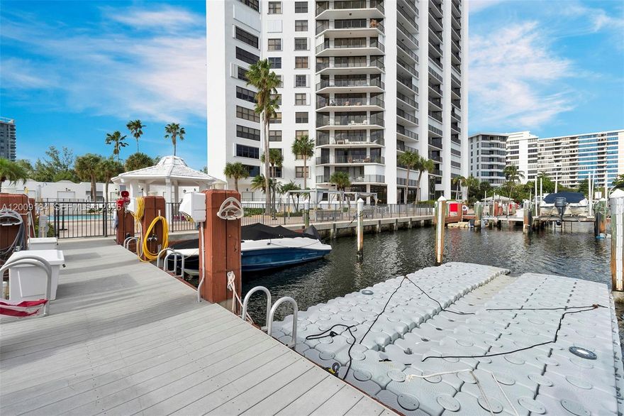 2 DEDED BOAT SLIPS INCLUDED for up to a 28 foot boat/multiple jet skis! No fixed bridges, right off of Intracoastal canal and a short distance from the Haulover Ocean inlet and ocean access.  Impeccable 2 bedroom/2 bath unit in highly desirable Three Islands. Modern, open kitchen with granite counter tops, stainless appliances. Large master suite with access to your spacious balcony. New A/C- Heater unit and a new washer/dryer inside the unit! 2 PARKING SPACES! Anchor Bay is a fantastic building with a grande lobby; Marina, gym, spa, spacious pool area, tennis and pickleball courts, BBQ area, roof top terrace.  Total HOA $1416 monthly. Seller will pay off special assessments prior to closing. Currently tenant occupied.