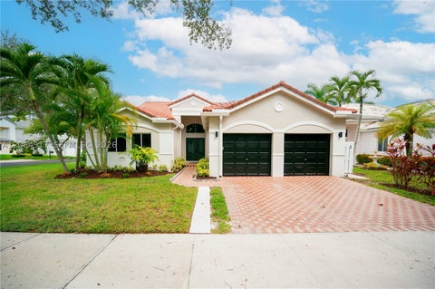 Photo of 1357 Camellia Ln, Weston, FL 33326 (MLS # A12064917)
