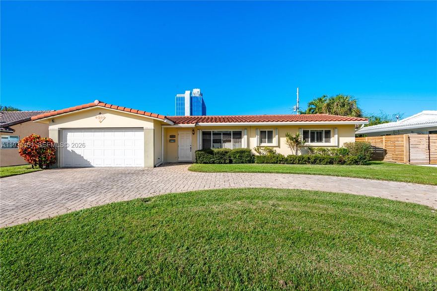 Located in a beautiful East Pompano Beach neighborhood- NO HOA FEES, this home offers an inviting open layout with sliding doors that lead to a spacious screened porch—perfect for relaxing or entertaining. The kitchen features a center island ideal for casual dining and hosting, while recent upgrades provide peace of mind, including a remodeled primary bath, new roof (2020), A/C (2025), water heater (2024), upgraded sprinkler system, and a new PVC fence enclosing the entire backyard with room to add a pool. The home also includes complete hurricane protection, wood-look tile flooring throughout the main living areas, plantation shutters, and electric window blinds. The garage can easily be converted into a third bedroom, adding flexibility to the floor plan. Enjoy a prime location within walking distance to shopping and an Intracoastal park, just 2 miles from two beaches, and conveniently close to I-95. Complete hurricane shutters.