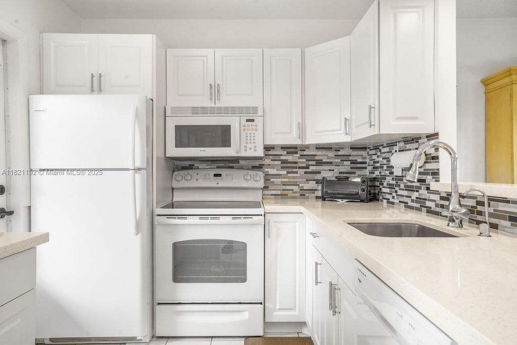 Photo of 4706 NW 36th St #616, Lauderdale Lakes, FL 33319 (MLS # A11821192)