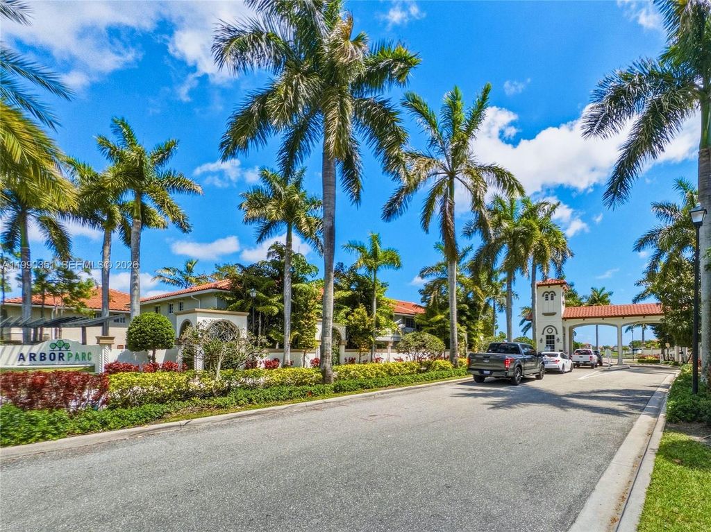 Photo of 6011 Woods Edge Cir #6011, Riviera Beach, FL 33410 (MLS # A11990351)