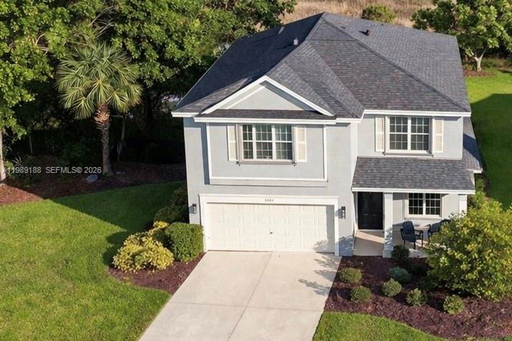 Photo of 3081 SW Solitaire Palm Dr, Palm City, FL 34990 (MLS # A11989188)