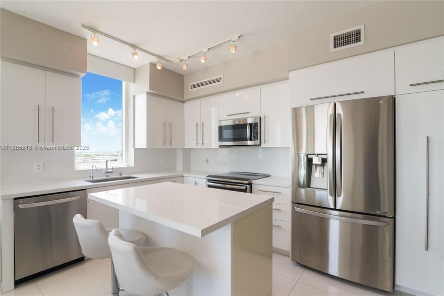 Available for November 1st. Furnished or unfurnished.  All new completely remodeled corner unit at Duo! Hallandale Beach. Gorgeous open Kitchen, High Gloss Cabinets, Quartz Counter Tops, High-End Stainless Steel Appliances, Movable Kitchen Island, Impact Windows and Doors. Customized Window Treatments, Solar Shades, & Blackouts. Spacious primary bedroom w/ built in custom closets & doors w/ huge bath w/ separate shower & jacuzzi style tub. Built-In Banquette Seating in Dining Area. Elegant 24x24 Porcelain Floors throughout. New lighting throughout.  2nd bedroom w/ built in work space. Large corner wrap around balcony with southern exposure. Full size stackable W/D in unit. Amenities: Tennis, gym, heated pool, valet & more. Walk to Groceries, Shopping & dining.