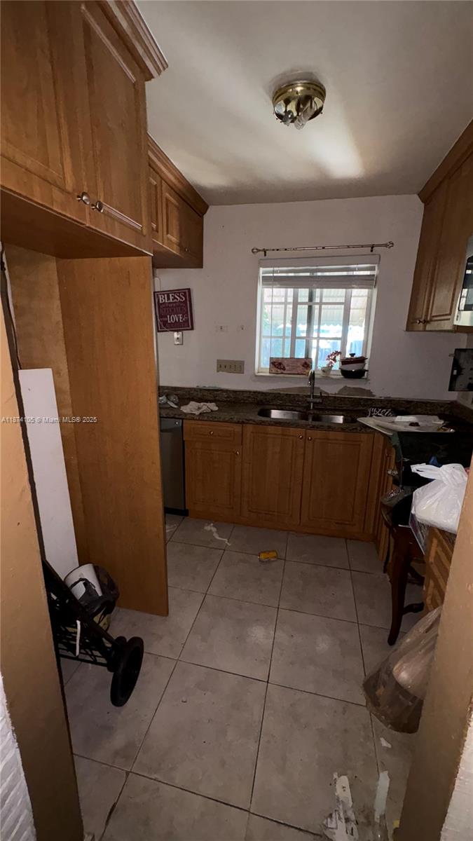 Investor Special! Endless potential for rehabbers, flippers, or buy-and-hold investors. Solid structure on a spacious lot with room to add value. Centrally located near schools, shops, and major highways. Property is being sold AS-IS—motivated seller, submit your best offer today!