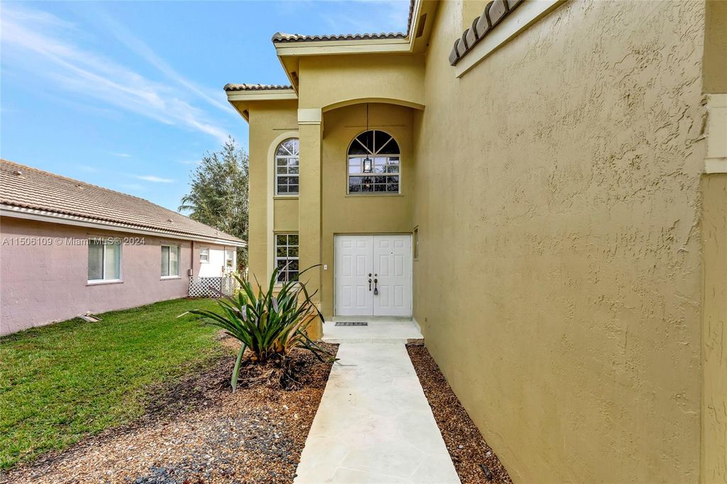 Photo of 133 SW 204th Ave, Pembroke Pines, FL 33029 (MLS # A11506109)