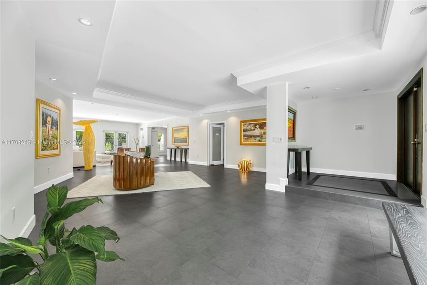 Beautiful one-story estate completely remodeled. Situated on one of the most prestigious streets. Surrounded by oak and banyan trees on Old Cutler Rd, near Ponce Davis and Gables Estates. Gated corner lot. The 4 bedrooms, 3.5 baths home features a large living room area with floor to ceiling impact windows and doors. Dining room, family room, office space and gourmet kitchen with walk-in pantry. Master suite on one side and a second master suite on the other side with 2 additional bedrooms and bathrooms. 
Near best schools, marinas and parks.
