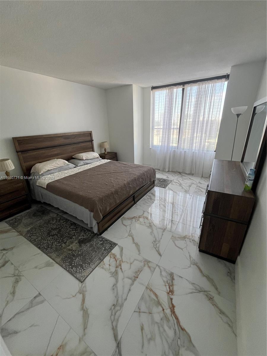 ALEXANDER TOWERS CONDO - Residential Lease