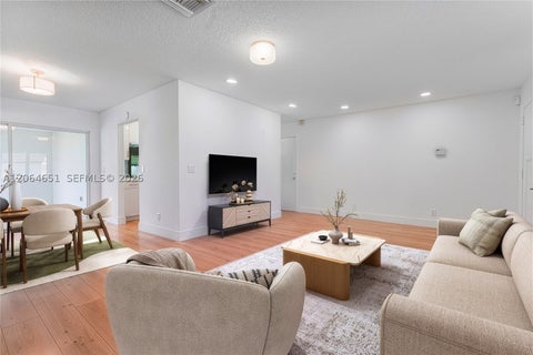 Photo of 8830 NW 17th St, Plantation, FL 33322 (MLS # A12064651)