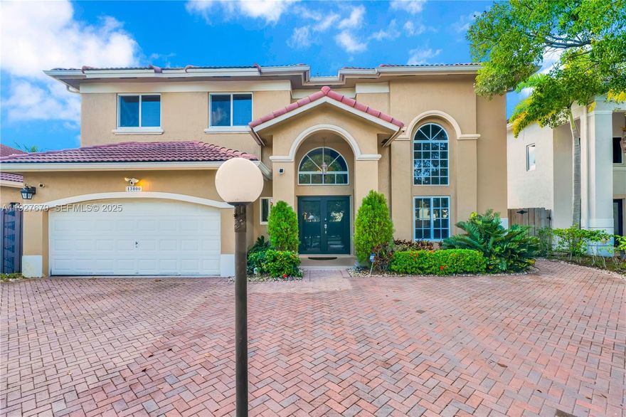 Stunning 4/3.5 turnkey home in the desirable Venezia Lakes, Kendall, located on a serene lake. This meticulously maintained property features new full interior and exterior paint, new AC, new impact windows, and a resurfaced pool, oversized concrete style porcelain floors. The expansive paver driveway has been upgraded to allow more spacious parking, the entire home boasts brand-new concrete-style floors along with remodeled bathrooms. Additional highlights include a whole-home generator for peace of mind during hurricane season. Bring your boat or jetski, lake is motorized friendly. Don't miss this move-in-ready gem! Pls send Highest And Best ! Very sought after community! Easy to show, Lender Credit for Buy down subject to offer ! Easily Add a bedroom on first floor.