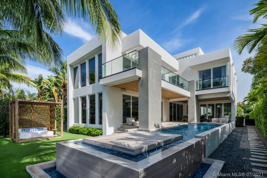 Located in the gated community of Normandy Isle, this custom built masterpiece offers 6,000 sf of meticulously crafted living space along with gorgeous finishes.  No detail was spared in the design of this home. 672 S Shore offers the highly sought after Miami lifestyle & was designed to blur the lines of indoor/outdoor living.  Inside the home you will find custom details including hand crafted cabinetry, tray ceilings, designer lighting, a full smart home including security cameras throughout, lighting, shades/drapes, surround sound speakers, thermostats, Dornbracht fixtures, custom closets, sand blasted marble floors, and a pivoting front door.  Outdoor living area has a spa, full summer kitchen with gas grill, ice maker, and fire pit.  Please contact agent for showings.