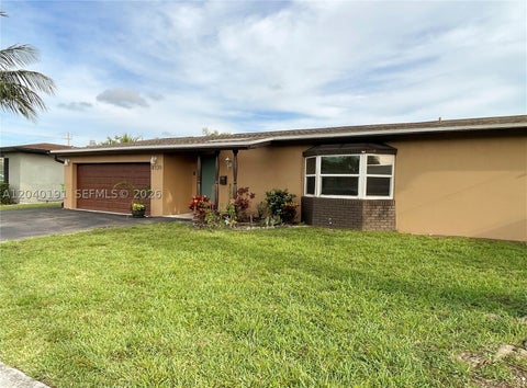 Photo of 8330 NW 20th Ct, Sunrise, FL 33322 (MLS # A12040191)