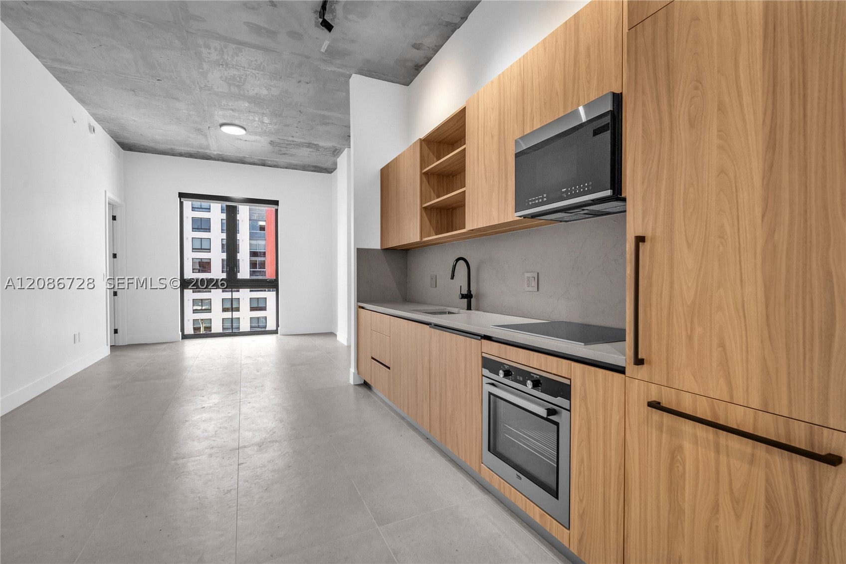 91 NW 27th St 403