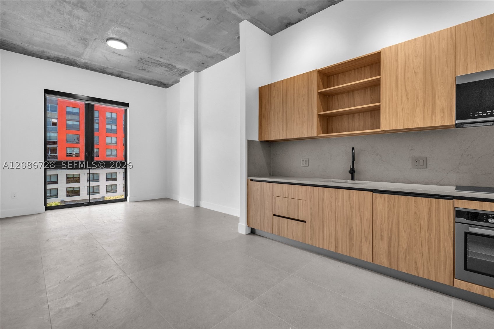 91 NW 27th St 403