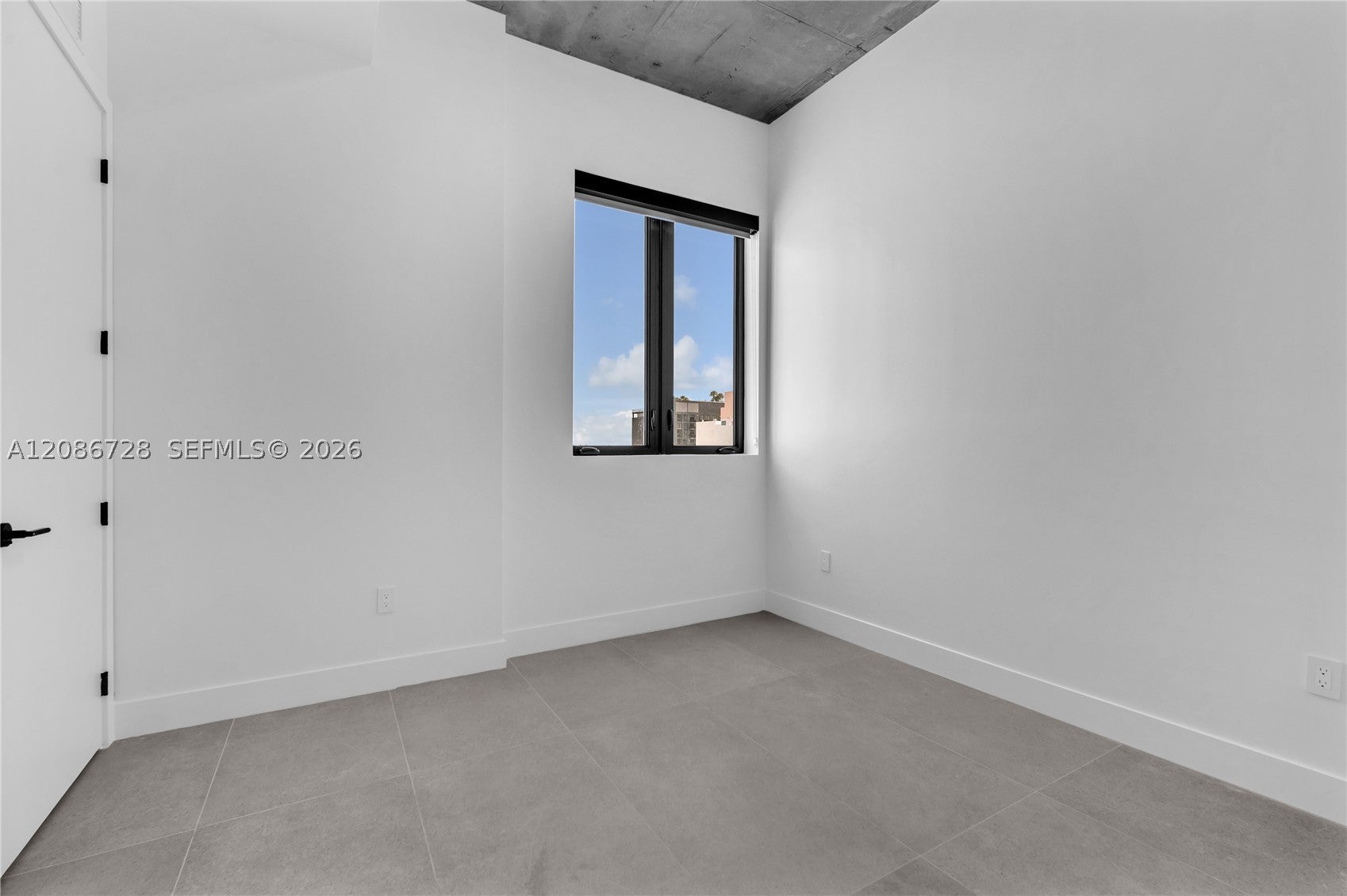 91 NW 27th St 403