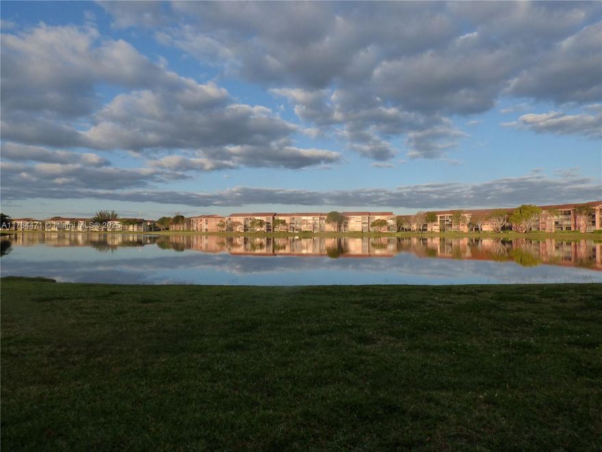 Century Village Plymouth. Newest Section of Community. Park at Your Door. Stunning 1st-floor, 2-bed, 2-bath Wide Lake Front View. Screened Porch. Spacious kitchen with a large breakfast Room and numerous windows. Tile & Wood Laminate Floors. Split Bedroom Floorplan. Stackable Washer & Dryer. Accordion Hurricane Shutters. Can be Sold Furnished. Storage Locker. Pool Patio Across the Street. Plenty of Guest Parking. Century Village of Pembroke Pines is a 55+ community, featuring a million-dollar clubhouse, transportation, two fitness centers, 24-hour security, eight swimming pools, tennis courts, a movie theater, billiards, a pharmacy, a cafe, golf, and so much more!