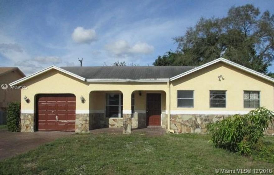 Lots of potential here to make this your dream home! Spacious 4 bed 3 bath home featuring tile floors in most rooms, an eat-in kitchen, upgraded bathrooms, a garage, a large screened patio with built in BBQ and a private backyard. No hoa! Great location close to major roads, schools, shopping and dining. Unpermitted additions/modifications may exist and are the responsibility of the buyer.