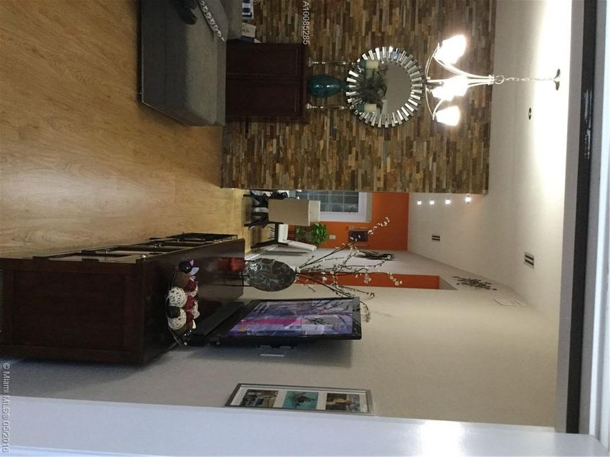 Beautiful one story 3/2 corner home. Completely remodeled throughout, new bathrooms, new kitchen , wood floor, new insulated aluminum roof on the terrace, SS appliances, front load W&D, AC system recently replaced, about 1.5 year old. Cozy back yard, Very neat house!! Close to shopping centers and Golf course, Won't last