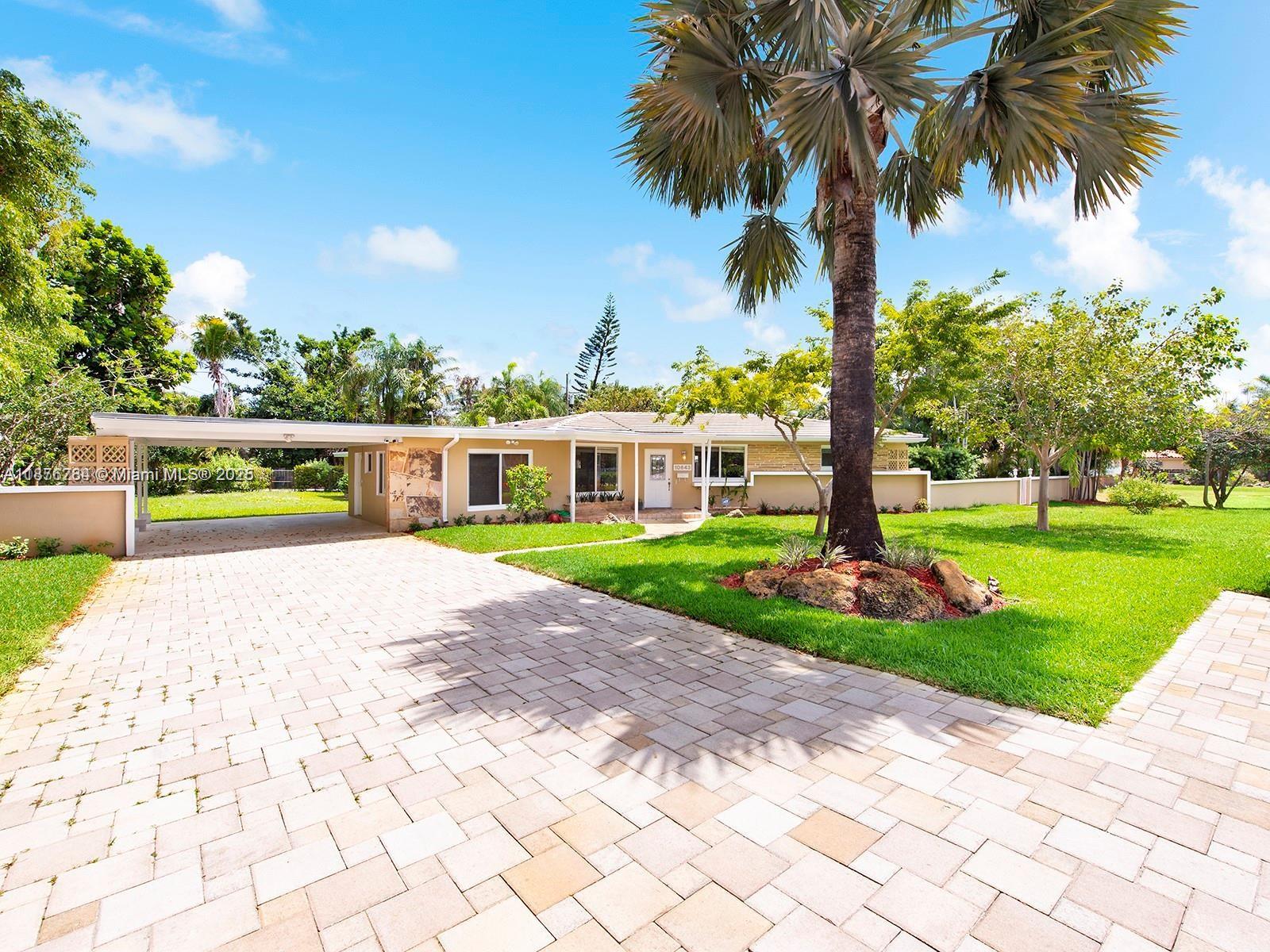 Available for rent: Stunning mid-century modern home in Miami Shores, steps from the golf course & Miami Country Day School. 4 beds, 3 baths, laundry, storage, double carport, and spacious driveway. Bright Florida room overlooks updated, very large pool, plus separate cabana perfect for entertaining or a studio. Terrazzo floors, skylights, impact windows, stainless steel appliances & granite counters. Furnished (extra) or unfurnished. Short-term lease welcome until Feb—flexible move-in options!