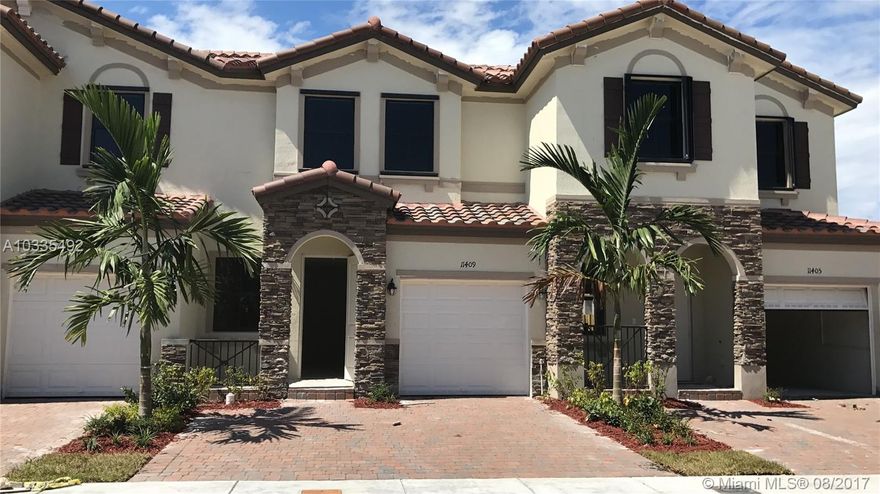 This beautiful townhouse. New construction. with beautiful green zones and privileged community. Very close to the turnpike express way. Malls, banks, Publix and excellent schools close. Tile in the first floor. carpet in the 2 floors. 2 Stories, 3 bed, 2.5 bath. Prime location and landscape spaces, children's play area, sparkling pool. beautiful kitchen with stainless steel appliances and counter top Granite. It has its own private back patio.