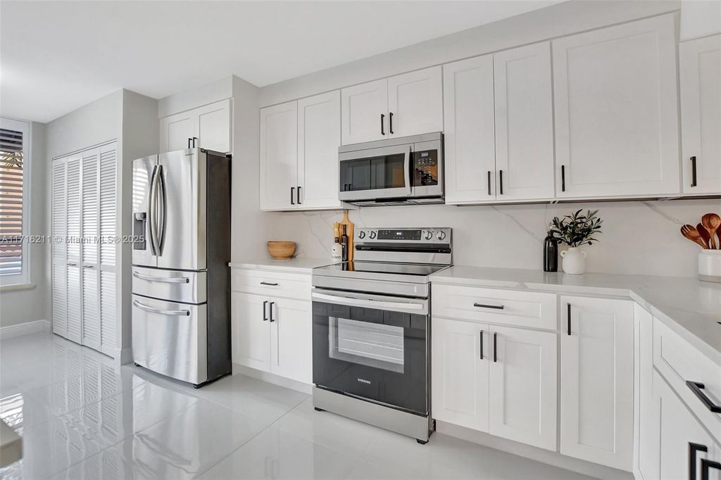 Photo of 7186 Promenade Dr #201, Boca Raton, FL 33433 (MLS # A11716211)