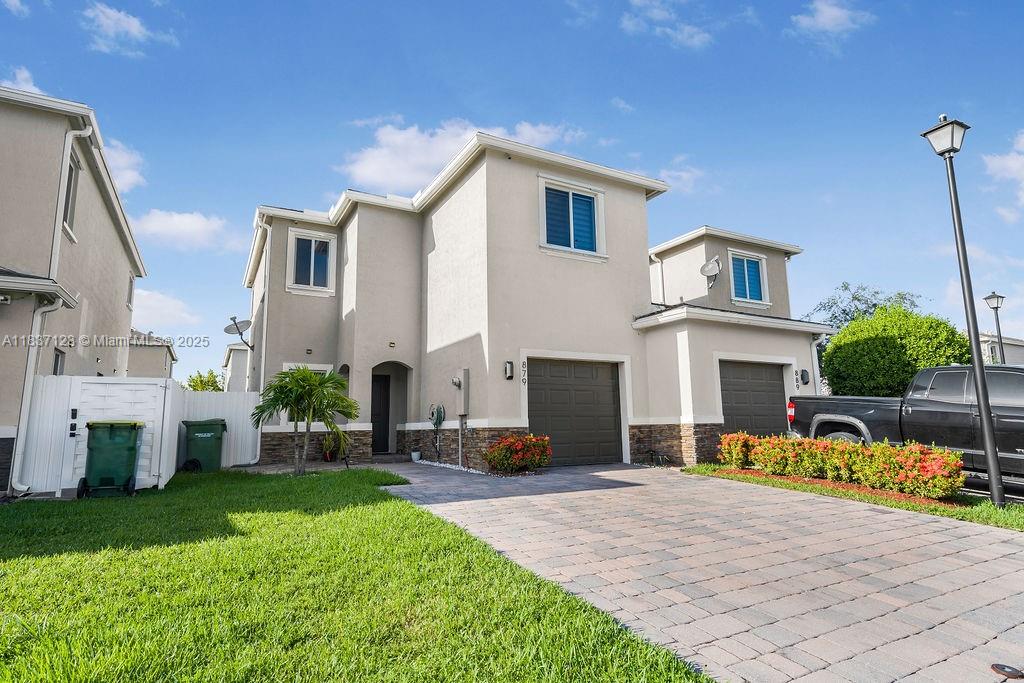 Welcome to this beautifully maintained 3 bed, 2.5 bath townhome in Avella Park, built in 2020 with only one owner. Downstairs features sleek tile flooring, upstairs offers cozy carpet, and the appliances are like new—oven and dishwasher never used! Step into your private backyard oasis—complete with a privacy fence, covered cabana, and ample space for entertaining or simply relaxing. Includes washer & dryer, 1-car garage + guest parking. Low HOA only $102/month. Prime location near Turnpike, US-1, Florida Keys Outlets, shopping, dining & more. This move-in ready gem offers the perfect blend of style, convenience, and Florida charm!