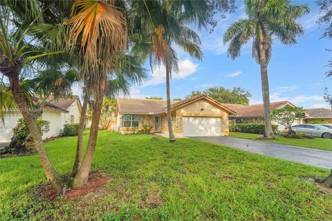 Photo of 2928 NW 94th Ave, Coral Springs, FL 33065 (MLS # A11883870)