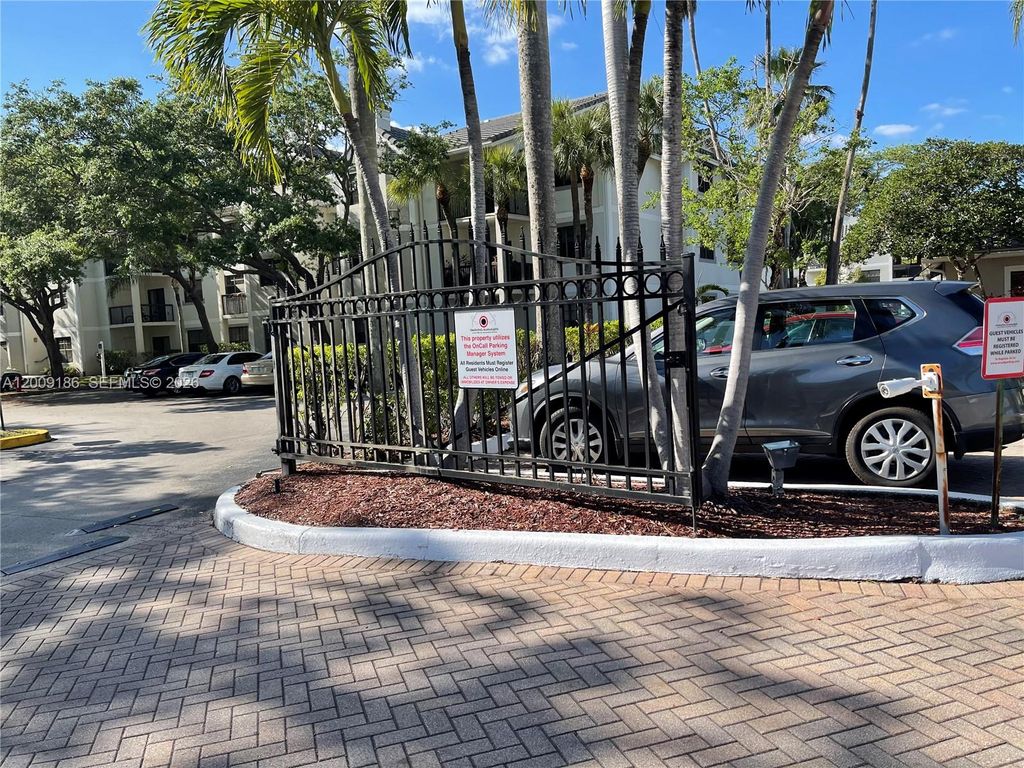 Photo of 11211 W Atlantic Blvd #102, Coral Springs, FL 33071 (MLS # A12009186)