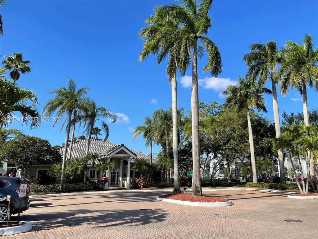 Photo of 11211 W Atlantic Blvd #102, Coral Springs, FL 33071 (MLS # A12009186)