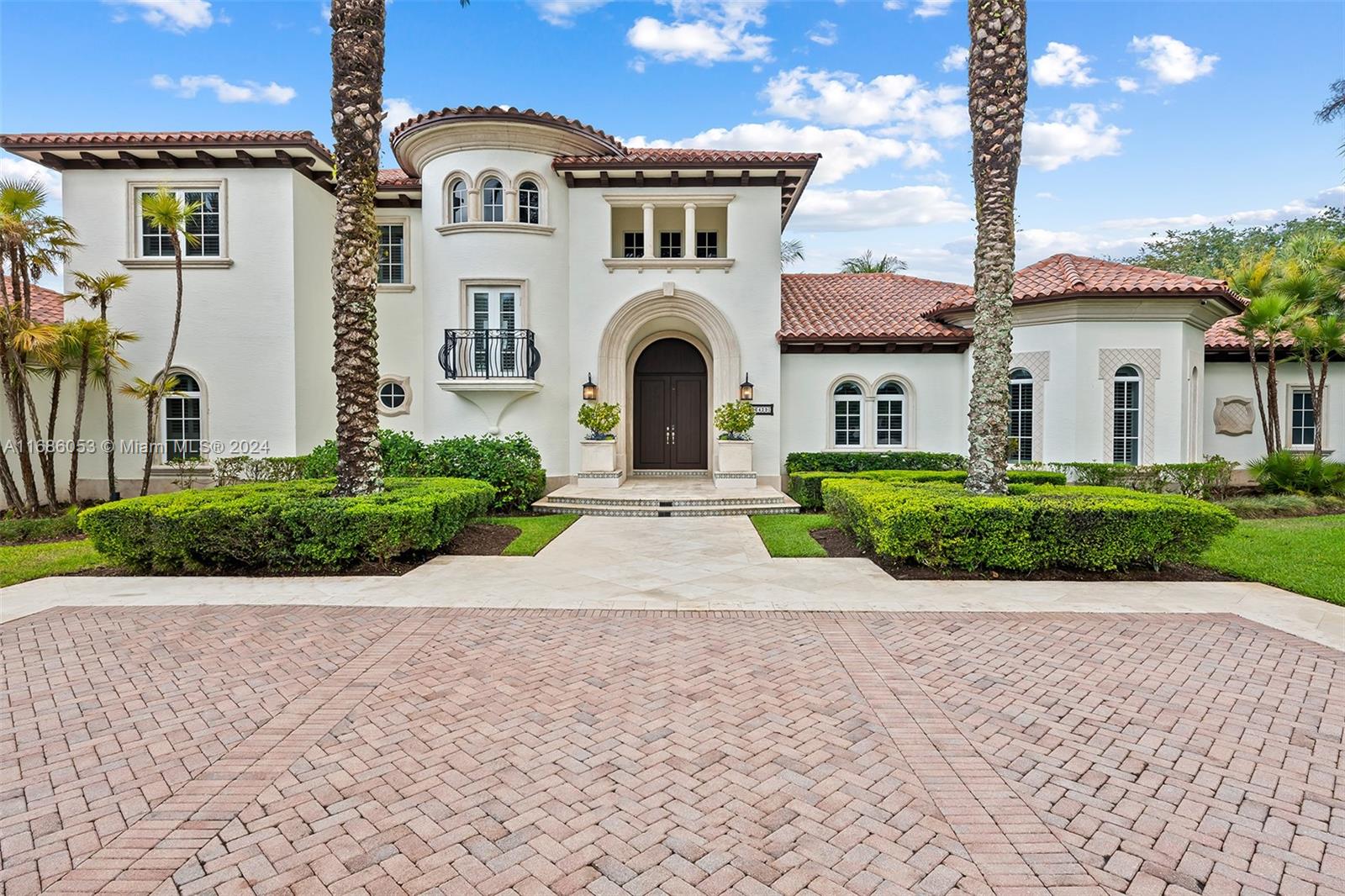 This Custom Mediterranean Estate exudes timeless grandeur in the most welcoming of ways, with warm, high end finishes and all the amenities one could desire. An ideal multi-generational compound. Located in the exclusive Estates of Pine Tree, one of only 5, acre + homes in the most private gated community in Parkland. This home has it all, Guest House, Basketball Court, Putting Green, Resort style heated salt Pool and Spa, Summer Kitchen, cigar lounge/studio, Bar, Office, Gym, you name it. Originally built and owned by a NFL Legend, this home offers timeless sophistication abounds with hand-painted imported Italian tile, marble, hardwood, coral & limestone finishes. Smart home tech, Whole Home water filtration/softening, propane generator with buried tank & more features than I can list.