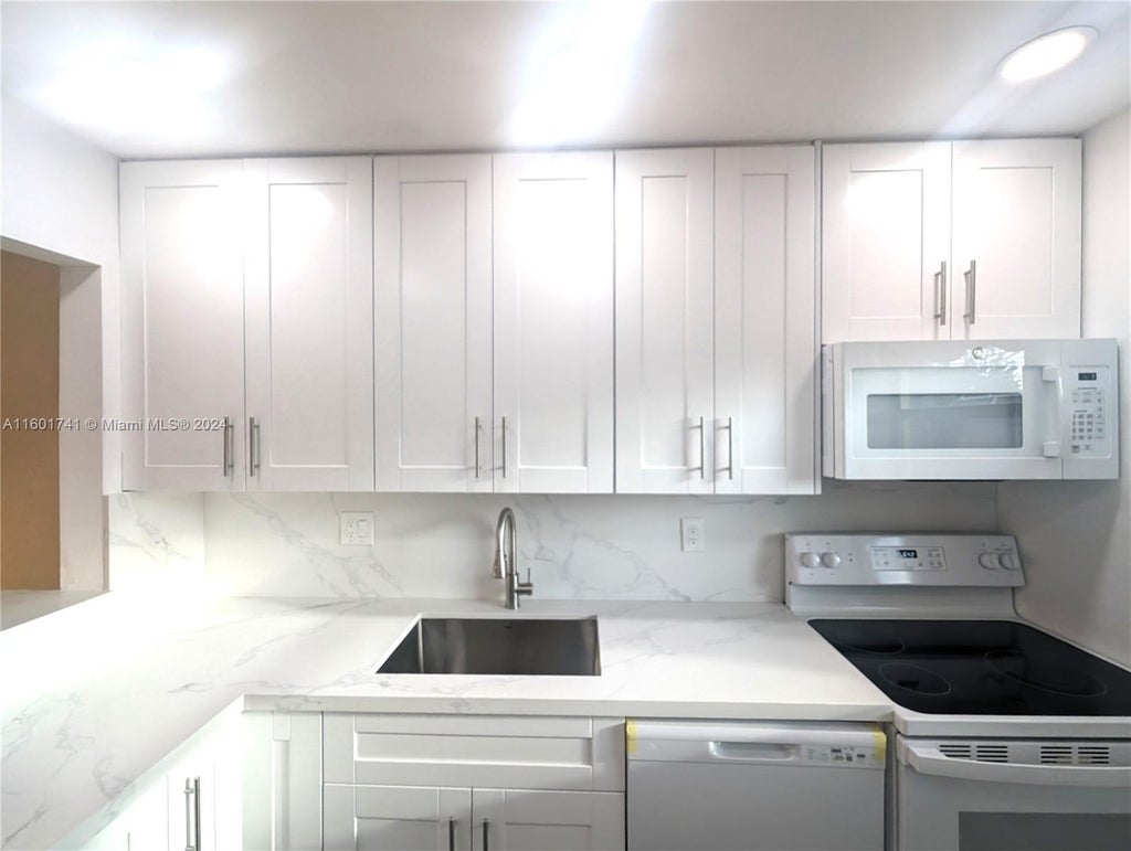 Photo of 206 Oxford #100, West Palm Beach, FL 33417 (MLS # A11601741)