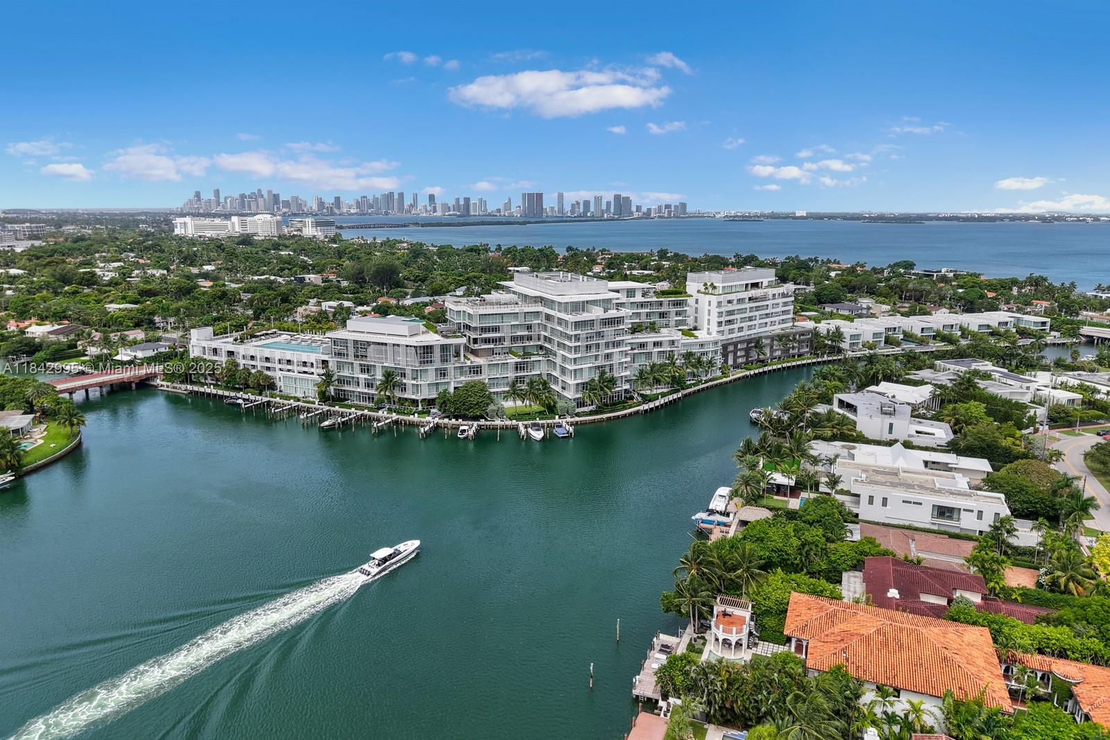 Experience luxury living at The Ritz-Carlton Residences, Miami Beach. This expansive 3-bedroom + den, 3.5-bath residence spans 4,247 sq ft of refined interiors, plus a sweeping wraparound balcony with breathtaking Bay, Ocean, and Skyline views. Arrive via your private elevator foyer into a stunning open-concept living space, flooded w/natural light through floor-to-ceiling glass. The chef’s kitchen is perfect for entertaining. The primary suite is a private retreat w/ wood floors, sitting area, and spa-inspired custom bath w/marble walls, freestanding tub, glass- shower, and dual vanity. Each bedroom has an en-suite bath and balcony access. Includes a 2-car climate-controlled garage and 1 additional parking space. Live the Ritz-Carlton lifestyle w/unparalleled resort amenities.