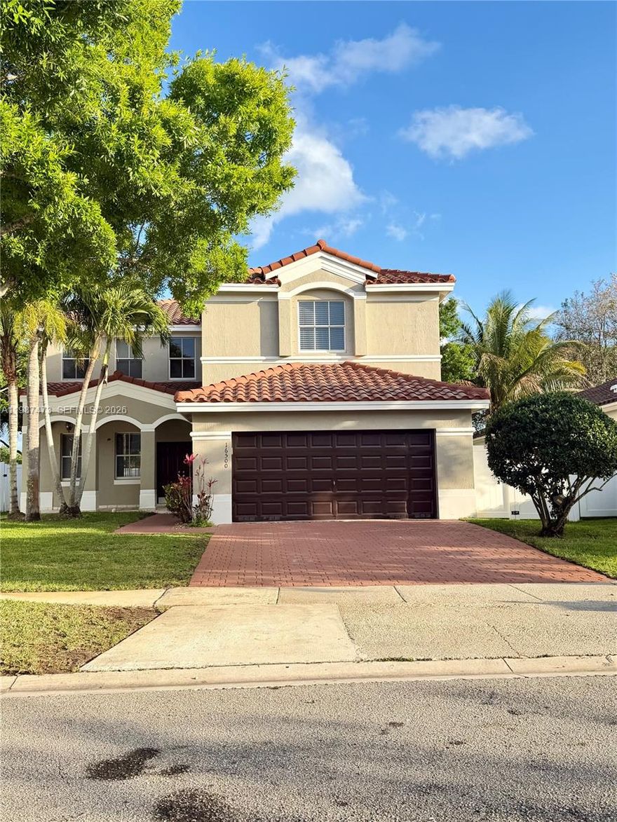 Stunning, bright, and spacious two-story home in the highly desirable Nautica community! This beautifully designed residence boasts soaring high ceilings and a split floor plan. Expansive master suite offers a sitting area, 2 walk-in closets and balcony, while the third bedroom also features its own en-suite. Modern kitchen with quartz countertops, walk-in pantry and breakfast area.Ceramic tile flooring on the main level and laminate upstairs. Large fenced backyard with a covered patio perfect for entertaining. Just a 3min. walk to resort-style amenities:pool & spa, pickleball & tennis courts, basketball court, fitness center, and guard-gated entrance. Ideally located near schools, shopping, dining and major highways for easy commuting. Easy to show, fast approval, no HOA approval.