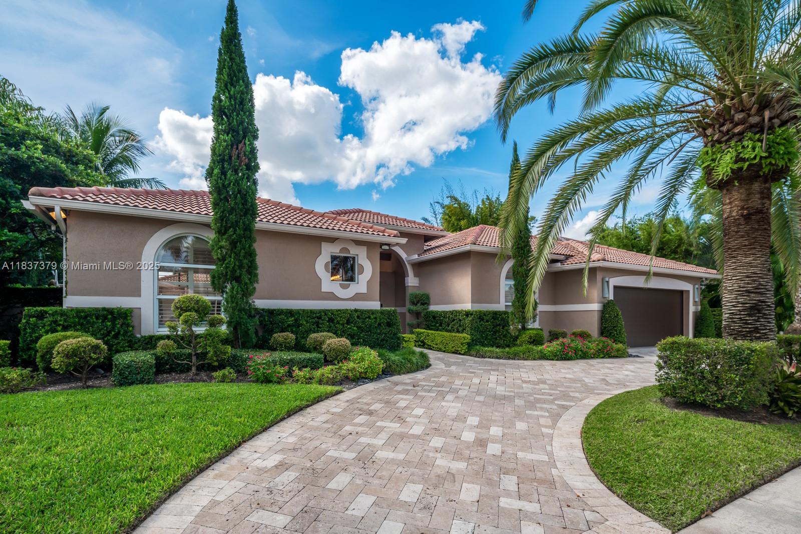 Welcome to Villa Valentina! This BEAUTIFUL, LIGHT & BRIGHT Courtyard home in the exclusive Weston Hills community is a true showpiece. Offered fully furnished, this Mediterranean villa with modern finishes features 5 bedrooms and 4 bathrooms, perfect for luxurious living. The courtyard oasis includes a freeform pool, retractable awning, and a 1BR/1BA detached guest house. The large open kitchen boasts wood cabinets, granite counters, a breakfast bar, and a pantry. Enjoy 12' ceilings, fresh paint, new light fixtures, a Ring system, and a water softener. The home also includes accordion shutters, an upgraded 2-car garage, and access to A+ schools.