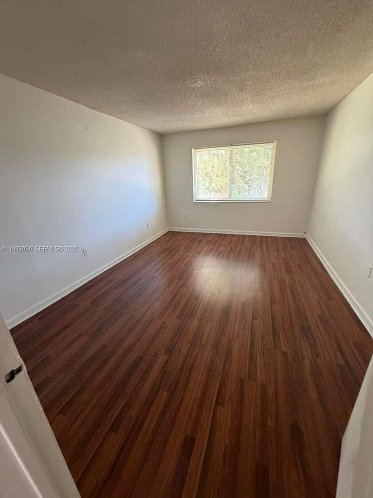 NEW WORLD CONDO APTS IV - Residential Lease