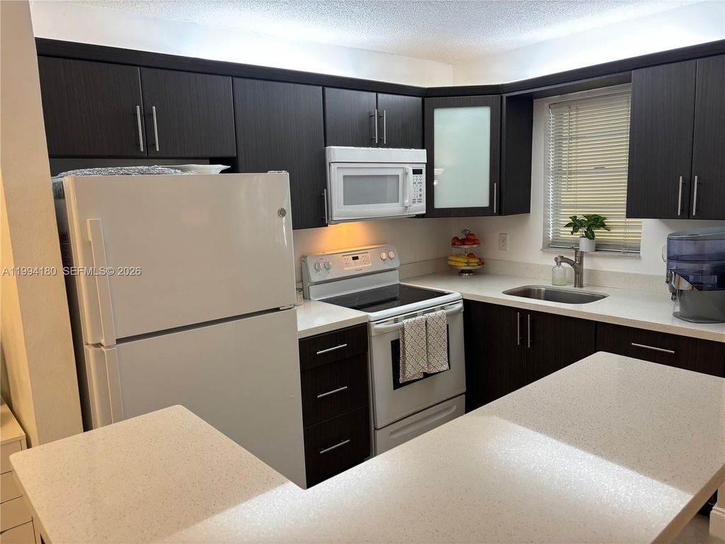 Photo of 1551 12th #12A, Hollywood, FL 33019 (MLS # A11994180)