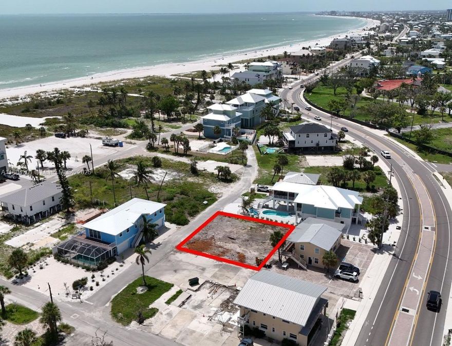 Build-Ready Luxury Estate Opportunity. A premier coastal lot offers the perfect blend of luxury design prime location& turnkey readiness—steps from the Gulf of Mexico. GULF SIDE. Luxury Poolside Living. Your future home includes a heated private swimming pool& an outdoor summer shower. Covered 145 sqft BBQ area. Build-Ready Specs Include: Lot size:75x75 ft, 3,078 sqft under AC, 4,012 total sqft, 3 Bedrooms+1 Flex Room, 4 Bathrooms (3 Full+1 Half), 3-story design with private elevator, Expansive balconies for Gulf views, Impact-resistant windows& doors, 3-car garage& elevated construction. Located on a quiet upscale street of multimillion-dollar homes, minutes from dining& marinas. Architectural & engineering plans included. ALL INFORMATION FROM THE SELLER AND MUST BE VERIFIED BY THE BUYER!