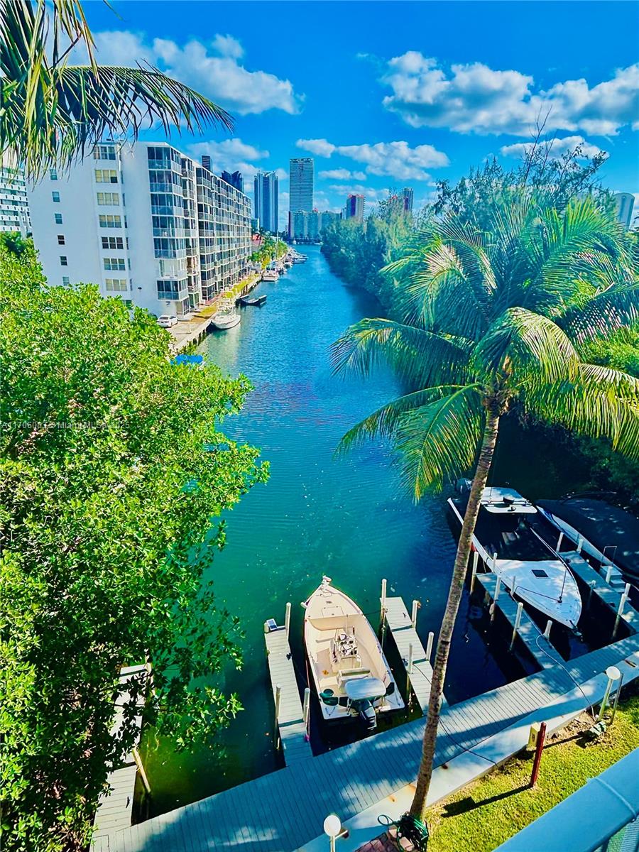Ideal top-floor unit with Deeded Boat Dock. 3-bed, 2-bath condo with direct access to your private boat dock, complete with water and electric. Nestled on a deep canal with no fixed bridges, you’re just minutes from the Atlantic Ocean, Haulover Inlet, and Miami’s stunning blue waters & sandy beaches. This elegant home features a spacious open floor plan, modern finishes, and a 40-ft east-facing balcony with breathtaking canal and bay views. 12 unit Boutique Building means you will enjoy private amenities without the crowds: a private pool, tanning deck, gym, recreation room, two parking spaces, and storage. With the beach only moments away and the exciting $1.5B Uptown Harbour redevelopment next door, this rare gem offers luxurious living and incredible future potential. Don’t miss out!